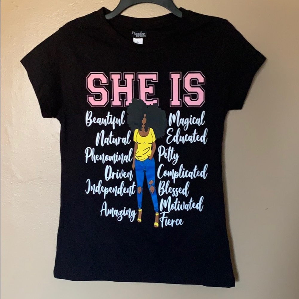 She is ... black tee